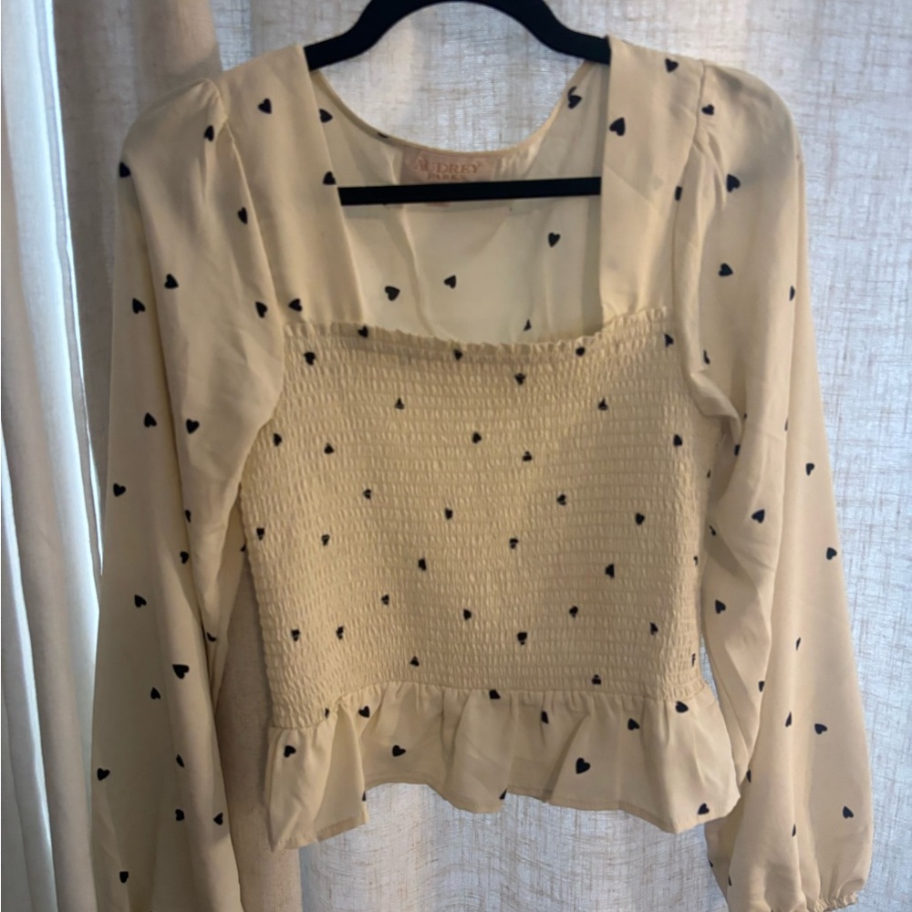 Francesca's Cream Smocked Peplum Top with Black Heart Print